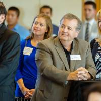 Guests listening to Tim Bulson speak.